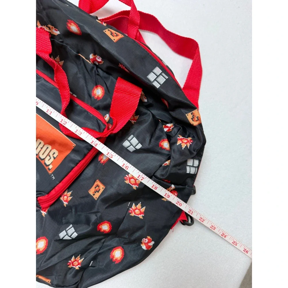 Nintendo Super Mario Bros CultureFly Pixel Art Duffle Bag Black Red Ripstop